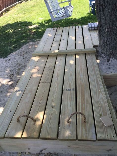 I was sick of the cats and chickens using the kid's sandbox as their own personal litter box so a covered sandbox was in the works. Until an idea came about to make a part of the sandbox a solid playdeck for the kid's chairs and table. And all of this built around a tree to save space! Playdeck, sandbox, and a toy storage area in one place. This is built from pressure treated lumber - 2X8s, 2X6s, 2X4s, and decking lumber. The 10X10 frame is built similar to a deck with supporting lu… Baby Outdoor Play, Sandbox For Kids, Diy Outdoor Play, Sandbox Ideas, Sandbox Cover, Diy Outdoor Living, Wooden Sandbox, Kid Playground, Diy Sandbox