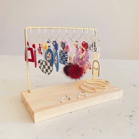 PRICES MAY VARY. Lemonadeus Unique Earring Hanger Rack Tabletop Jewelry Display Stand, Brass Metal Hanging Jewelry Towers clothing Rack Earring Holder with Rings Holder Wood Base Cute Gift for girls, women, bff gift- Everyone will love this ADORABLE unique earing holder stand. It can store your amazing collection earrings, a perfect earings display. Unique Design acrylic earings holder- easy to assemble, every hanger can be able to take apart for easy travel. Space saver and cute earings display Hangers For Earrings, Earring Hanger Rack, Earings Holders, Clear Hangers, Earrings Hanger, Rings Tray, Jewelry Shelf, Earring Rack, Coat Hanger Stand