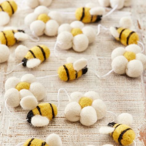 🐝🌼 Bee Friendly Fun! 🌼🐝 Our wool felt garland features sunny daisies and buzzing bees—perfect for any celebration or room decor! Each purchase supports people and the planet, made by a World Fair Trade organisation approved supplier.🌍💚 #BeeFriendly #EcoDecor #FairTrade #celebratesustainably #partydeco #decorations #garlands #homedeco #homedesign #ecofriendlyliving #sustainablity #lovenamasteuk❤ #birthdaydecorationsideas Needle Felting Mobile, Needle Felt Bee, Needle Felt Garland, Felted Garland, Felted Bee, Homemade Mobile, Wool Garland, Felt Easter Crafts, Daisy Garland