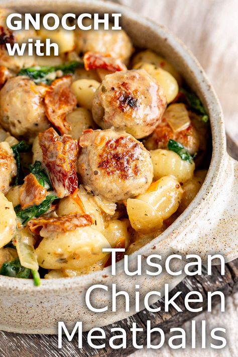 This Tuscan Chicken Meatballs with Gnocchi is a cozy and hearty recipe that can be made in the slow cooker or on the stovetop. Succulent chicken meatballs seasoned with Italian herbs, sun-dried tomatoes, and garlic, bathed in a rich Tuscan-inspired creamy sauce, all mingling with pillowy-soft gnocchi. It's the kind of dish that makes you want to throw on your favorite sweater, grab a bowl, and curl up on the couch. This chicken meatball recipe is easy to make and uses easy-to-find ingredients. Healthy Elizabeth, Gnocchi Recipes Healthy, Chicken Meatball Recipe, Ground Chicken Meatballs, Slow Cooker Pasta Recipes, Meatball Dinner, Chicken Meatball, Chicken Meatball Recipes, Ground Chicken Recipes