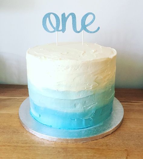 Rough iced blue ombré smash cake (4 x 9 inch layers) Ombre First Birthday Cake, Ocean Themed Smash Cake, Plain Smash Cake, Ombré Blue Cake, 4 Inch Smash Cake, One Cool Dude Smash Cake, Summer Cake Smash Boy, The Big One Smash Cake, Blue And White Smash Cake