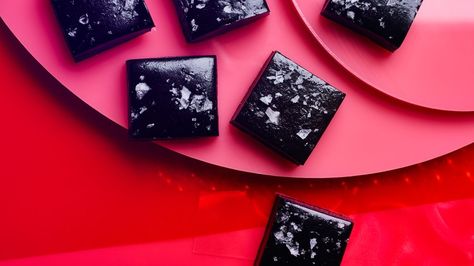 Salted Black Licorice Caramels Recipe | Bon Appetit Licorice Caramels Recipe, Gluten Free Licorice, Anise Candy, Liquorice Recipes, Spring Candy, Caramel Recipe, Black Food Coloring, Licorice Candy, Coconut Candy