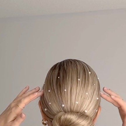 Pearls In Bun Wedding, Slick Back Pony With Pearls, Bridal Ponytail Pearls, Bridal Low Bun With Pearls, Slick Bride Hair, Bridesmaids Hair With Pearls, Low Bun Pearls, Pearls Hair Wedding, Sleek Hair With Pearls