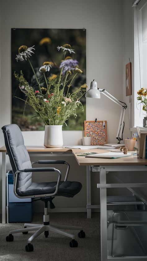 Elevate your workspace with a touch of nature! This beautiful home office setup features vibrant wildflowers in a simple vase on a sleek LINNMON desk, perfectly complemented by a comfortable MARKUS office chair and a stylish FJÄLLA storage box. A colorful pinboard adds personality, while the TERTIAL work lamp ensures focused light for productivity. Discover how to create an inspiring environment that uplifts your mood and sparks creativity! Click to explore more styling tips and ideas! #HomeOfficeInspo #IKEAStyle #WildflowerDecor #WorkspaceGoals #ProductivityBoost Linnmon Desk, Beautiful Home Office, Ikea Style, Wildflower Decor, Simple Vase, Minimalist Vase, My Home Office, Work Lamp, Office Inspo