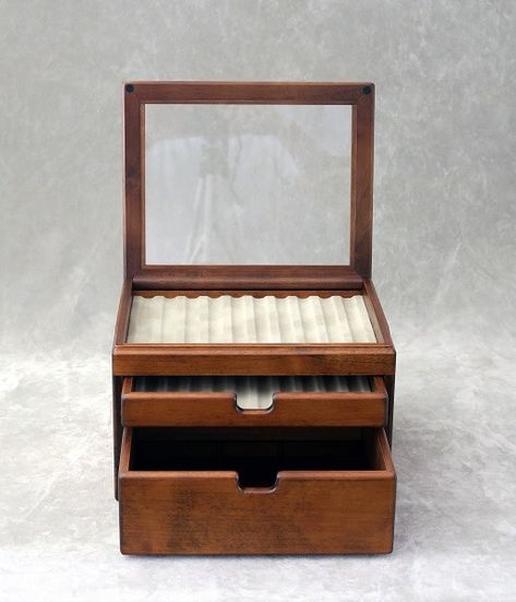 Elegant storage for fountain pens, watches, cuff links, writing implements, and other accessories.   You can display your favorite 10 fountain pens under the top-mounted transparent lid.   In the shallow drawers, there is   a tray with 10 grooves that can be flipped over to reveal a flat surface covered with fabric.   This is perfect for writing implements, watches, and other accessories.   The larger drawer is split into 9 sections. This is useful for storing different ink bottles or other items.   | Fountain Pen Ink Storage, Organizing Boxes, Stationary Storage, Japan Home, Pen Storage, Wooden Design, Organization Boxes, Fountain Pen Ink, Large Drawers