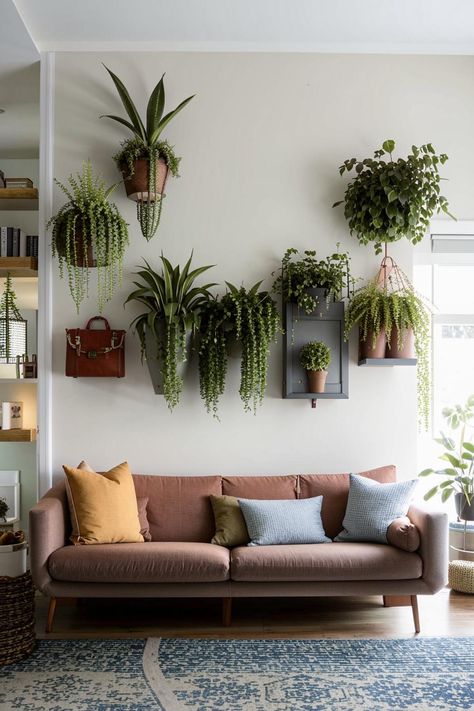 Elevate your living room with stunning wall decor above your couch! Discover inspiring ideas featuring plants, artwork, and more. Find the perfect pieces to create a cozy and stylish atmosphere. Plants Artwork, Living Room Plants Decor, Lush Greenery, Chic Decor, Lush, Living Room Decor, Couch, Room Decor, Wall Decor