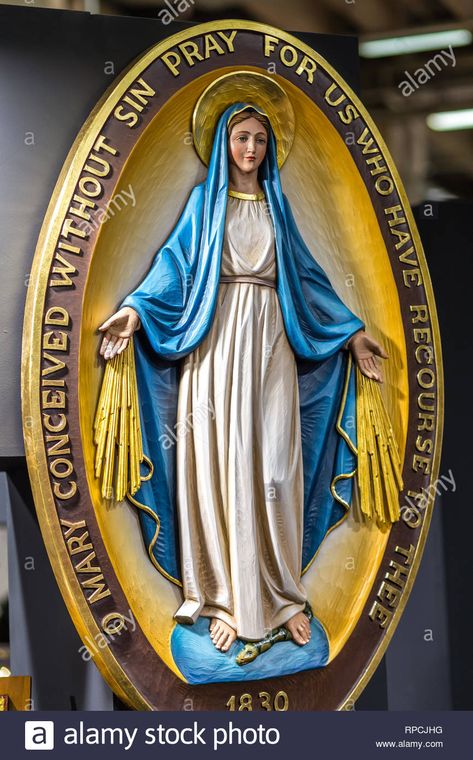 Download this stock image: BOLOGNA, ITALY - FEBRUARY 18, 2019: lights are enlightening statue of The Miraculous Medal at stand of ART DEMETZ in DEVOTIO Religious products and se - RPCJHG from Alamy's library of millions of high resolution stock photos, illustrations and vectors. Our Lady Of The Miraculous Medal, Miraculous Medal Art, Italy February, Daughters Of Charity, Blessed Mother Statue, Our Father Prayer, Mother Mary Images, Virgin Mary Statue, Mama Mary