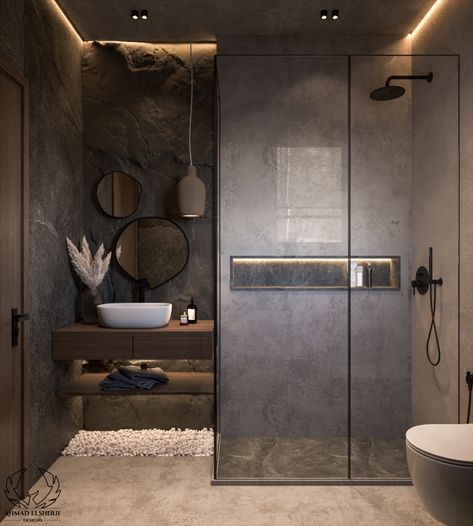 The space radiates serenity and coziness, with muted grey tones providing a serene backdrop. The simple design emphasizes the beauty of simplicity, while natural textures and organic forms provide warmth.
#bathroomRedesign #wabiSabiBathroom #greyBathroom #cozyBathroom #wabisabiInterior #homeDecor #bathroom Concrete Texture Bathroom, Stone Grey Bathroom, Bathroom With Bronze Fixtures, Wabisabi Bathroom, Stone Shower Ideas, Contemporary Washroom, Bathroom Vibes, Earthy Bathroom, Wabi Sabi Interior