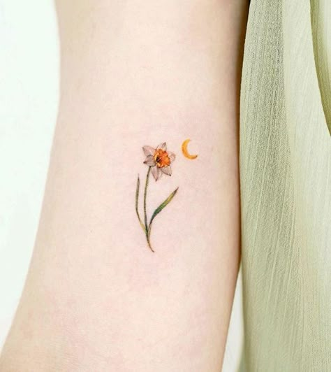 110+ Amazing Daffodil Tattoo Designs with Meanings, and Ideas 69 December Flower Tattoo Birth Month, December Flower Tattoo, Daffodil Flower Tattoos, Narcissus Flower Tattoos, 10 Tattoo, Daffodil Tattoo, Flower Thigh Tattoos, Flower Tattoo Shoulder, Tattoo For Son