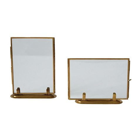 Store and display your favorite memories with beautiful brass and glass standing photo frame. (Holds 5" x 7" photo) 7"L x 5-1/2"H Pick the style that fits your photo best -- horizontal or vertical ONLINE GUESTS PLEASE SPECIFY HORIZONTAL OR VERTICAL Greige Design, Brass Photo Frame, Brass Frames, Brass Picture Frames, Glass Photo Frames, Metal Picture Frames, Creative Co Op, Frame Stand, Glass Photo