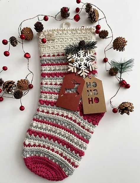 Meet the Noel Stocking Crochet Pattern: A Classic Holiday Beauty! – The Crochet Village Free Crocheted Christmas Stocking Pattern, Crocheted Stockings Pattern, Knitted Xmas Stockings Free Pattern, Crochet Stockings With Names, Crochet Vintage Christmas Stocking Pattern Free, How To Crochet Stocking, Simple Crochet Stocking Pattern Free, Crochet Stockings Christmas Pattern, Christmas Crochet Stockings Free Pattern