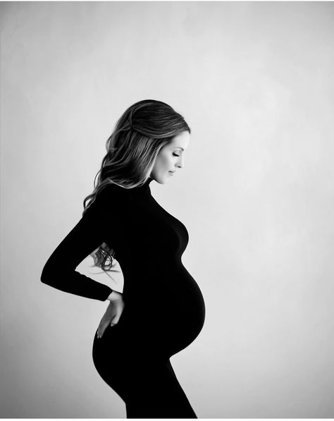 Chic Maternity Photoshoot, Sleek Maternity Shoot, Monochrome Maternity Shoot, Maternity Photos Black Bodysuit, Black Dress Studio Maternity Pictures, Maternity Photo Shoot Ideas Studio Family, Maternity Black Dress Photography, Tasteful Maternity Photos, Timeless Maternity Shoot