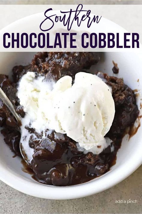 This easy Chocolate Cobbler is a classic Southern dessert recipe. With a delicious brownie-like topping over a rich fudge sauce, it's like a lava cake but simpler to make. //addapinch.com #chocolatecobbler #chocolate #dessert #addapinch Hot Chocolate Pudding, Baked Chocolate Pudding, Pudding Cake Recipe, Southern Recipes Desserts, Chocolate Cobbler, Chocolate Pudding Cake, Cobbler Topping, Homemade Vanilla Ice Cream, Southern Desserts