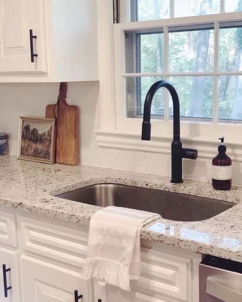 White herringbone backsplash