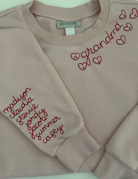 Grandma's favorite names hand stitched in red thread on a cozy faded pink sweatshirt.   Sweatshirts are Unisex sizing and run true to size.  I suggest sizing up for a more oversized fit. 70/30 cotton/polyester 3-End fleece, ring spun cotton  *Please note that all sweatshirts for this listing are for faded pink long-sleeved crewneck with set-in rib neckband, cuffs & hem band. If you are looking for a specific color sweatshirt please message me and I'll see what I can do. Returns and Exchanges: I Embroidered Clothes Ideas, Embroidered Sweatshirt Diy, Embroidery Sweater Diy, Sweatshirts Ideas, Grandma Sweatshirt, Diy Sweatshirt, Embroidery Sweater, Hand Embroidery Projects, Embroidery On Clothes