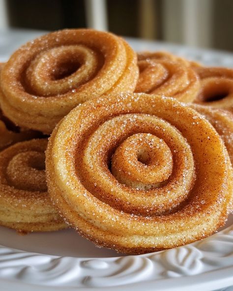 Churro Cookies are the perfect blend of crispy edges and soft, cinnamon-sugar goodness. These delicious cookies bring all the flavors of your favorite churros in a bite-sized treat. With their irresistible cinnamon-sugar coating, they’re a great addition to your cookie jar or a fun dessert for any occasion. Try the recipe today and share the sweetness with your family and friends! Churros Cookies, Churro Cookies, Mexican Desserts, Fun Dessert, Delicious Cookies, Mexican Dessert, Cinnamon Sugar, Yummy Cookies, Cookie Jars