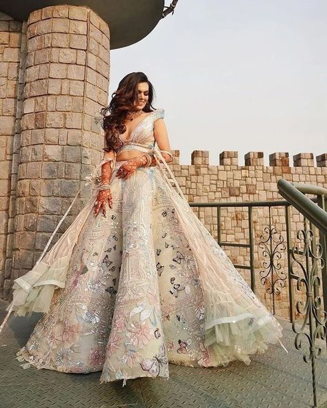 Wedding Kalakar Fashion on Instagram: “Princess vibes From dreamy pastel lehenga with butterflies and flowers to beautiful rosy makeup to royal background, everything about…” Indian Bridal Wear Red, Rosy Makeup, Pastel Lehenga, Royal Background, Girls Boutique Dresses, Engagement Gowns, Princess Vibes, Latest Bridal Lehenga, Indian Outfits Lehenga