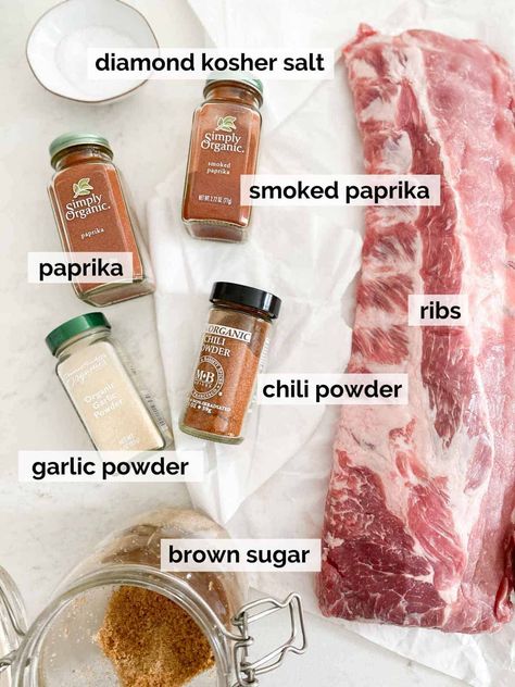 These dry rub oven ribs are so easy! Made with baby back ribs and a simple dry rub, they have super minimal clean up and are fall-off-the-bone tender just from baking in the oven! With a homemade BBQ sauce made from the drippings, you'll love this summer recipe! Great for BBQ's and gluten free/dairy free friendly. Crockpot Ribs Dry Rub, Baked Ribs Oven Dry Rubs, Baby Back Rib Rub Recipes, Easy Dry Rub For Ribs, Dry Rub Beef Ribs, Pork Rub Recipe Dry, Dry Rub Ribs In Oven, Rub For Beef Ribs, Baby Back Rib Rub