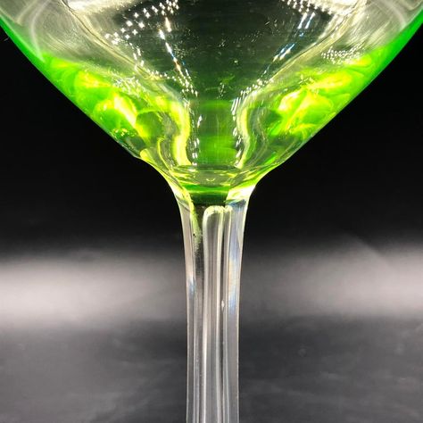 This exquisite set of five uranium glass wine glasses will add an extraordinary touch to your table arrangement. Each glass is artfully decorated with a wave pattern. Uranium glass, known for its bright green color and subtle radiance, blends stylishly into both modern and classic table decorations.  The wave pattern on each glass creates a fascinating light reflection and emphasizes the special nature of the uranium glass.   Each glass is perfectly balanced and comfortable to hold, making it id Green Aura Aesthetic, Green Wine Glasses, Collage Idea, Aura Aesthetic, Green Aura, Goblet Wine Glasses, Blue Wine Glasses, Bright Green Color, Crystal Wine Glasses