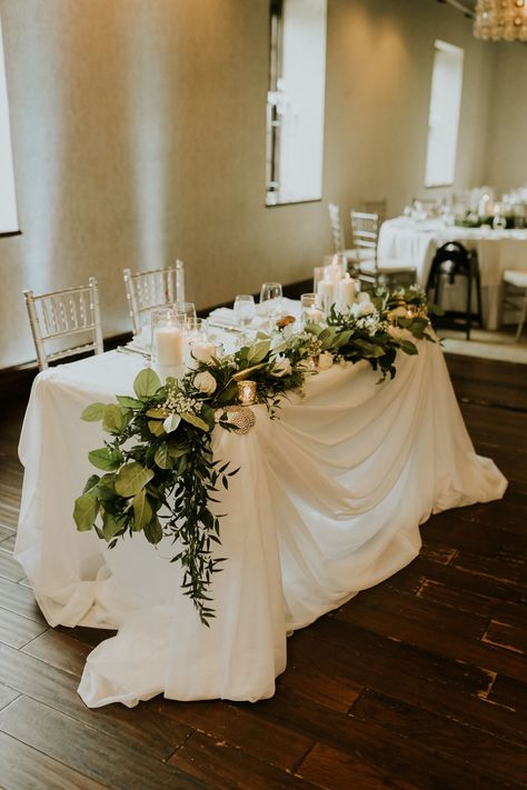 Couple Wedding Table Decor, Flowers On Sweetheart Table, 6 Ft Sweetheart Table, Candle Head Table Wedding, Sweetheart Table With Garland, Sweetheart Table Greenery Garland, Sweetheart Table Wedding Decor Ideas, Sweetheart Table With Sign, Garland On Sweetheart Table