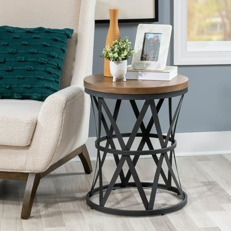 This mixed-media Powell Byrne Round Barrel Side Table offers an attractive brown finish in pine veneers that works well with the durable charcoal powder metal finish. This round barrel table is a wow value, with it's mix of materials, and sleek design. This table is a perfect cross between casual rustic and industrial farmhouse. Table Dimensions: 19.88" W x 19.88" D x 18" H, 16.98 lbs. Color: Gray. Barrel End Table, Barrel Table, Charcoal Powder, Metal Barrel, Wood Accent Table, Accent Side Table, Living Room End Tables, Industrial Farmhouse, Table Dimensions