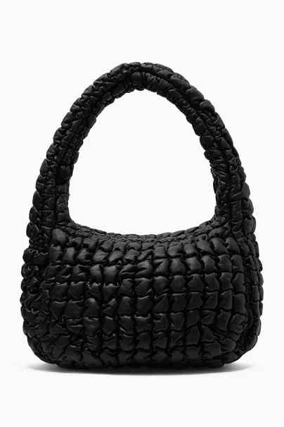 THE QUILTED BAG. A COS ICON. Cos Bags, Black Quilted Bag, Autumn Winter 2023, Micro Bag, Cloud Bag, Oversized Bag, Quilted Crossbody Bag, Bags Aesthetic, Mini Crossbody Bag