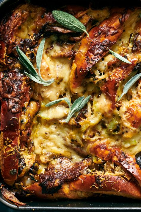 Mushroom Bread Pudding Recipe - NYT Cooking Thanksgiving Recipes Potluck, Herby Bread, Thanksgiving Bonfire, Holiday Potluck Ideas, Butter Stuffing, Fall Potluck Ideas, Christmas Potluck Ideas, Mushroom Bread Pudding, Mushroom Bread