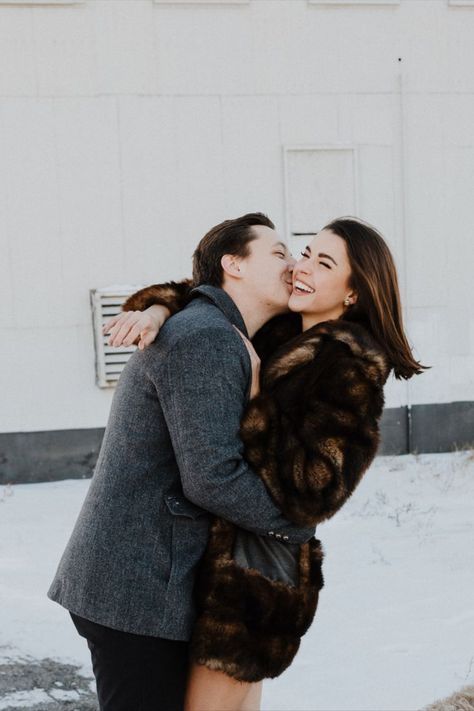 Couple Winter Photoshoot #fur #furcoat #couple #couplephotoshoot #coupleposes #downtown #downtownphotoshoot #photoshoot #photoshootideas #fallphotoshoot #winterphotoshoot #engagementphotoshoot #highboots #highkneeboots#poses Couple Winter Photoshoot, Couple Winter, Anniversary Photoshoot, Winter Photoshoot, Fall Photoshoot, Engagement Photoshoot, Couples Photoshoot, High Boots, Knee High Boots