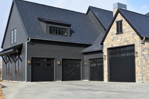 Steel Carriage Garage Doors | Vidor Garage Doors Composite Garage Doors, Carriage Garage, Black Garage Doors, Carriage House Doors, Carriage Garage Doors, Custom Garage Doors, Park City Ut, Custom Garages, Steel Wood