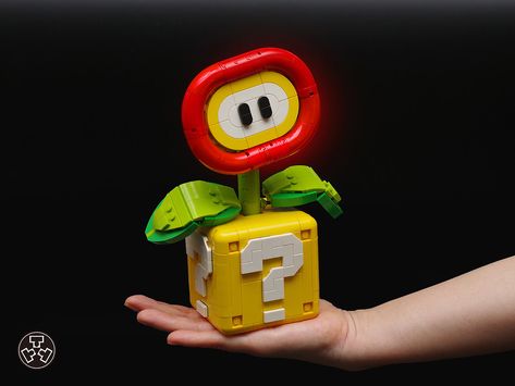 Super Mario Fire Flower, Lego Fire, A Question Mark, Lego Mario, Piranha Plant, Lego Videos, Lego Super Mario, Lego Pictures, Fire Flower