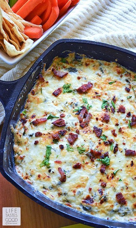 Cheesy Kale and Bacon Dip | by Life Tastes Good is a tasty mix of cheeses, kale, bacon, and a splash of wine for that little extra somethin' somthin' . This appetizer dip is delicious served hot or cold and goes great with vegetables, chips, crackers, you name it! It is a real winner with the added bonus of having good-for-you kale mixed in. Kale Dip Recipes, Vegetables Chips, Kale Dip, Bacon Kale, Savory Dips, Bacon Dip, Kale Recipes, Side Dish Recipes Easy, Tapenade