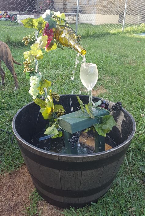 Bottle Fountain Diy, Fontaine A Punch, Wine Bottle Fountain, Bottle Fountain, Wine Bottle Flowers, Fountain Diy, Barrel Fountain, Diy Wine Bottle, Taman Air