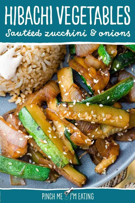 Make these homemade hibachi vegetables in just 15 minutes! With a simple ingredient list, these sautéed zucchini and onions are just like the hibachi veggies you'd find at a Japanese steakhouse like Benihana! Hibachi Chicken And Vegetables Blackstone, Hibachi Zucchini And Mushrooms, Hibachi Chicken And Zucchini, Hibachi Zucchini And Squash, Healthy Hibachi Chicken And Vegetables, Veggie Hibachi Recipes, Grilled Zucchini And Onions, Japanese Steakhouse Vegetables, Blackstone Hibachi Veggies