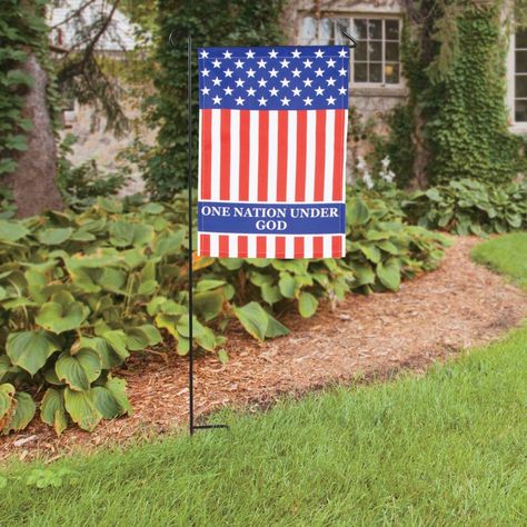 Display your love of country and your love of faith with this Religious Patriotic Garden Flag. Hang it on your own garden flagpole around the 4th of July or all summer long. Printed with the stars and stripes and "one nation under God." Polyester. 12 3/4" x 18" Flagpole not included. Imported. © OTC Patriotic Garden, Patriotic Decorations Party, Patriotic Garden Flag, One Nation Under God, Usa Pride, Small Flags, Fabric Display, Patriotic Party, Wedding Party Supplies