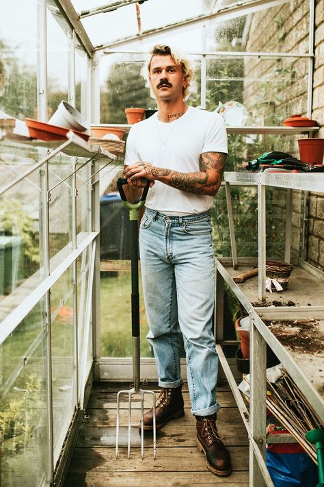 Self sufficient hobby gardener in a greenhouse | premium image by rawpixel.com / Felix Gardener Portrait, Gardener Fashion, Farmer Portrait, Streetwear Portrait, Photo Farm, Model Streetwear, Person Photo, Tshirt Streetwear, Fall Streetwear