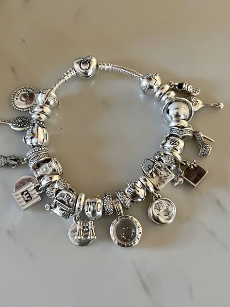 Pandora Charms With Meaning, Pandora Bracelet Inspo Silver, Pandora Bracelet Charms Aesthetic, Pandora Bracelet Aesthetic Silver, Full Pandora Bracelet, Pandora Charms Aesthetic, Pandora Charm Bracelet Aesthetic, Pandora Bracelet Aesthetic, Charm Bracelet Aesthetic