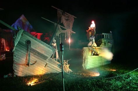 Prop Showcase: We were overrun by Pirates, again!! Halloween 2011 Display PICTURES Pirate Ship Halloween Yard, Sinking Pirate Ship, Halloween Pirate Ship, Pirate Shipwreck, Ship Sinking, Haunted Pictures, Pirate Halloween Decorations, Shipwrecked Vbs, Paper Head