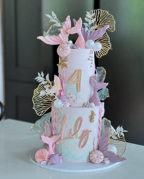 🩷 Mermaid 🩷 Still shot of this beauty from the weekend that was delivered to @littleville.uk in Orpington for a gorgeous party that was styled by @mylittleteaparty Design inspiration from @bakesinthebarns I’m on admin this morning sending invoices and sketches. Xx Name & number charm: @rowanandcocreative Mermaid stencil: @lissieloulondon Colours: @cocoa.colour #cake #mermaidcake #kentcakes #sevenoakscakes #cakedecorating #cakedecorating #cakeart #mermaidparty #londoncakes Mermaid Cake Design, Mermaid Birthday Party Cake, Mermaid Cupcake Cake, Mermaid Stencil, Mermaid Baby Shower Cake, Mermaid Theme Cake, Magical Cake, Cake Mermaid, Mermaid Baby Shower Theme