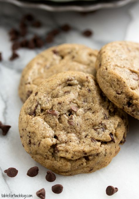 Cafe Mocha Cookies. Made with butter, dark brown sugar, sugar, eggs, vanilla, all-purpose flour, bread flour, cornstarch, baking soda, salt, coffee grounds, and mini chocolate chips. Mocha Cookies, Cafe Mocha, Cookie Table, Café Mocha, Table For Two, Coffee Dessert, Food And Travel, Tea Cakes, How Sweet Eats