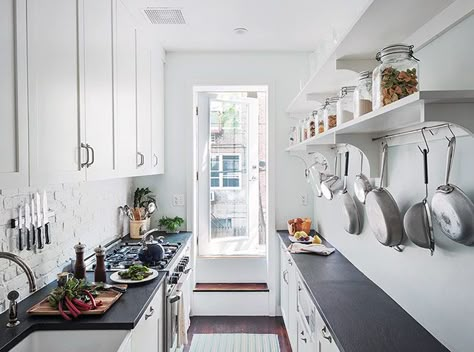 Credit: Matthew Williams Thanks to a knocked-through, raised ceiling, this narrow galley kitchen in Brooklyn, New York, feels a lot larger t... White Galley Kitchens, Kitchen Galley, Small Galley Kitchen, Model Dapur, Galley Kitchen Design, Galley Kitchen Remodel, Galley Kitchens, Narrow Kitchen, Kabinet Dapur