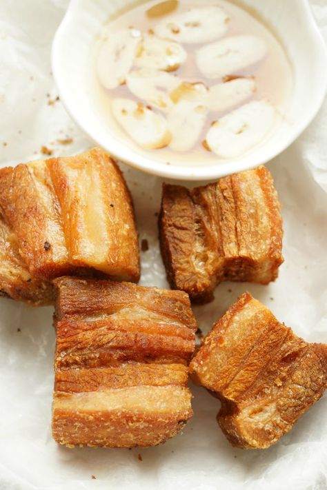 A Filipino Cuisine. THIS IS THE BEST LECHON KAWALI… AND IT IS MADE OF ONLY THREE INGREDIENTS… HOW TO COOK CRISPY LECHON KAWALI -FILIPINO CRISPY FRIED PORK BELLY http://www.theskinnypot.com/how-to-cook-crispy-lechon-kawali-filipino-crispy-fried-pork-belly/ Pinoy Dishes, Baked Gifts, Lechon Kawali, Fried Pork Belly, Pub Grub, Pinoy Foods, Filipino Recipe, Filipino Cuisine, Pork Belly Recipes