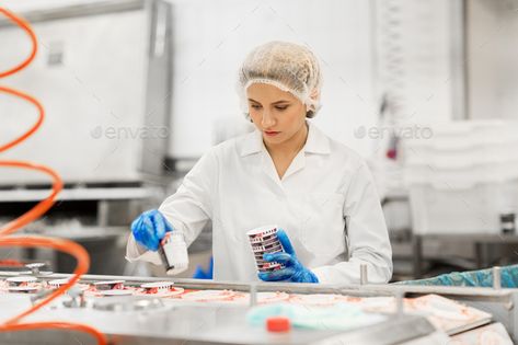 woman working at ice cream factory conveyor by dolgachov. industry, food production and people concept – woman working at ice cream factory conveyor#cream, #factory, #conveyor, #woman Factory Photography, Ice Cream Factory, Infographic Design Process, Food Factory, Dairy Desserts, Food And Beverage Industry, Technology Photos, Food Production, Food And Beverage