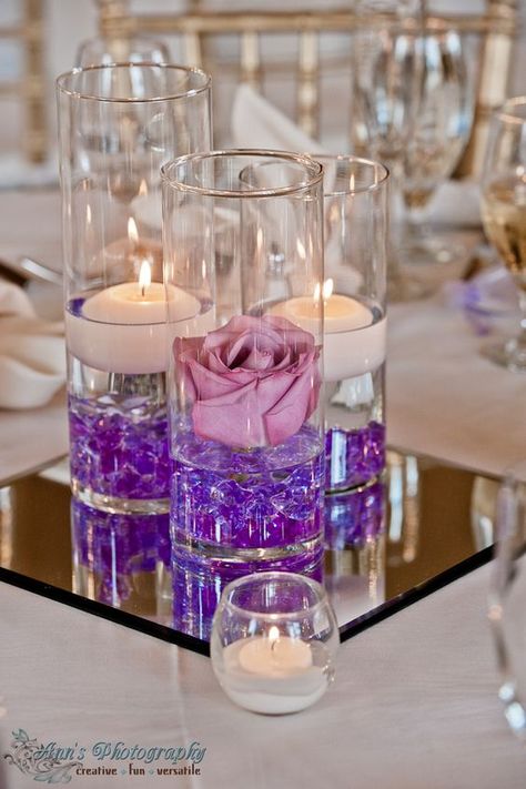 Purple Floating Candle Wedding Centerpiece / http://www.himisspuff.com/purple-wedding-ideas/13/ Quinceanera Decorations, Vase Centerpieces, Wedding Table Centerpieces, Floating Candles, Purple Wedding, Decoration Table, Quinceanera, Table Centerpieces, Wedding Centerpieces