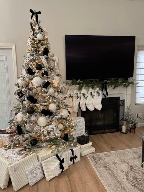 Black And Ivory Christmas Tree, Flocked Tree Decorating Ideas Black, Simple Black Christmas Tree, Flocked Fir Christmas Tree, Flocked Christmas Trees Black And White, Black And White Tree Theme, Gray And Black Christmas Tree, Black White Wood Christmas Tree, Black White And Gold Xmas Tree