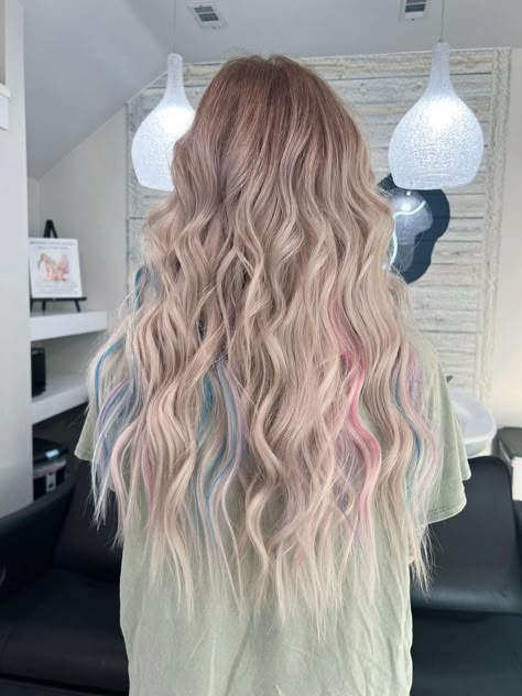 Blonde With Pastel Peekaboo, Blonde Hair With Pastel Peekaboos, Hair Extensions With Tinsel, Blonde With Blue And Pink Highlights, Opal Highlights Hair, Colors In Blonde Hair Fun, Blonde Hair With Colorful Peekaboos, Blonde Colorful Hair Ideas, Pops Of Pink In Blonde Hair