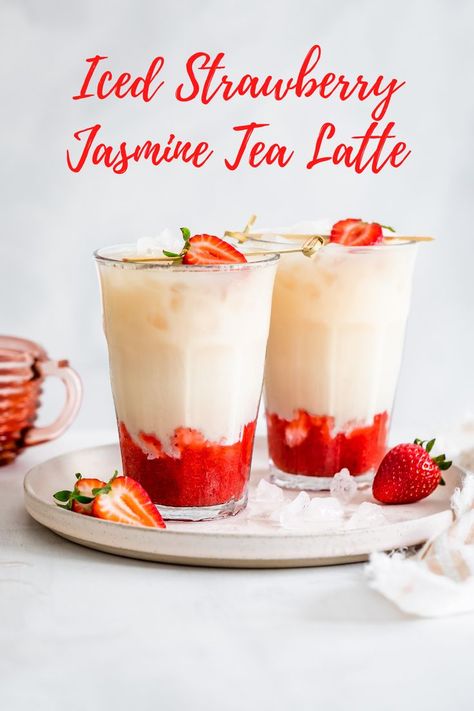 A refreshing jasmine tea latte brightened up with honey-sweetened strawberry syrup. This floral jasmine milk tea has a fruity twist sure to become your favorite beverage! Recipe by Snixy Kitchen. #californiastrawberries #jaseminetealatte #latte #strawberrydrinks #tealatte #strawberrytealatte #strawberrylatte #icedbeverages #summerdrinks #icedtea #strawberryicedtea Herbal Mocktails, Summer Latte, Jasmine Milk Tea, Tea Lattes, Tea Latte Recipe, Milk Tea Recipes, Tea Drink Recipes, Jasmine Tea, Strawberry Syrup