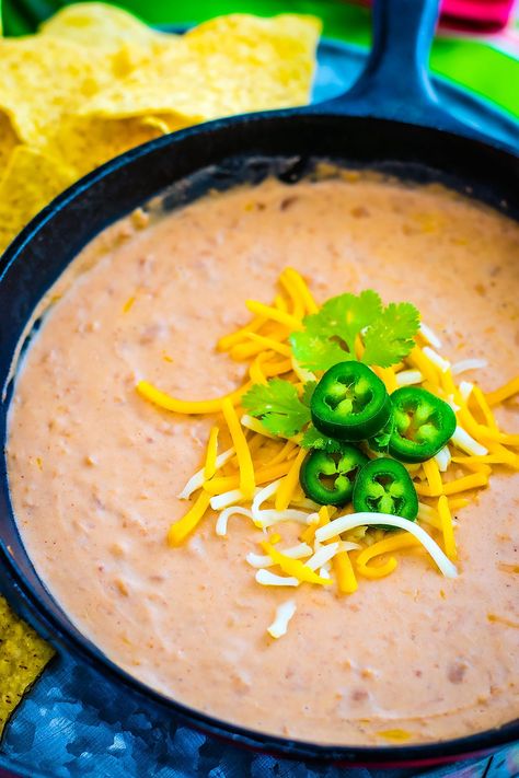 Get creamy Restaurant Style Refried Beans by adding a few ingredients to canned refried beans! These easy refried beans are the perfect side dish, great on tostadas, Mexican Pizzas, tacos or burritos, and even a tasty dip!  #refriedbeans #mexicanfood #easyrefriedbeans #restaurantstylerefriedbeans Restaurant Bean Dip, Restaurant Refried Beans, Restaurant Style Refried Beans Recipe, Can Refried Beans Recipe, Mexican Refried Beans Recipe, Best Refried Beans Recipe, Restaurant Style Refried Beans, Mom Snacks, Refried Beans Recipe Easy