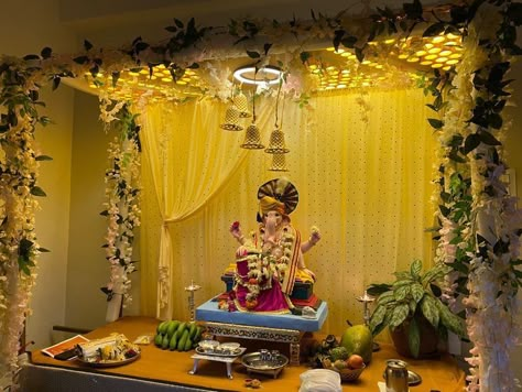 Ganesh Theme Decoration, Ganapati Decoration With Flowers, Decoration Ganesh Festival, Diy Mandap Decoration, Light Decoration For Ganpati, Ganapati Decoration Background, Decorating Ideas For The Ganpati, Banana Tree Decoration For Pooja, Ganesha Background Decoration