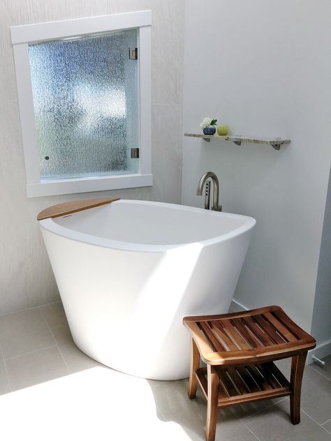 Location: San Francisco, CA, USA Model Featured: Aquatica True Ofuro Freestanding Stone Japanese Soaking Bathtub. This unique, modern take on the traditional Japanese-style bathtub is made for seated soaking. So the design incorporates a built-in seat and the depth of the tub has been extended to 24.25” (61.5 cm) to ensure full body immersion for even 6ft (180 cm) plus bathers. #Japanesestylebathtub #soakingtub #deepbathtub Sit In Bathtub, Ofuro Tub, Soaking Tubs, Tiny Soaking Tub, Japanese Soaking Tub Shower Combo Small Bathrooms, Japanese Soaking Tub Small Bathroom, Wet Room With Japanese Soaking Tub, Japanese Soaking Tubs For Two, Japanese Soaking Tub Shower Combo