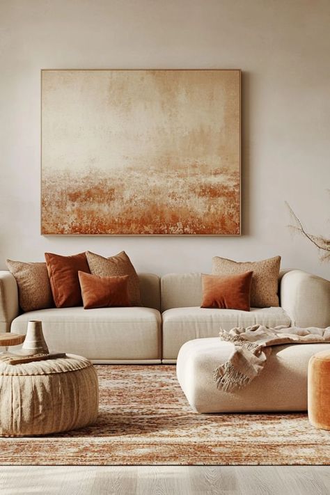 Add warm earth tones to your living room for a cozy and modern feel that’s both stylish and inviting. #EarthTones #ModernLivingRoom #CozySpaces Muted Interior Design, Living Room Neutral Colors Earth Tones, Warm Earthy Living Room, Warm Toned Living Room, Cozy Modern Living Room, Earthy Living Room, Modern Boho Living Room, Modern Cozy Living Room, Neutral Living Room